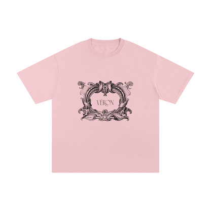 Pink t-shirt with decorative black logo and 'VERON' text on a white background