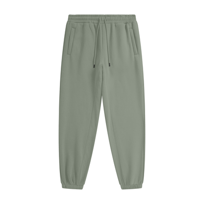Green sweatpants on a white background