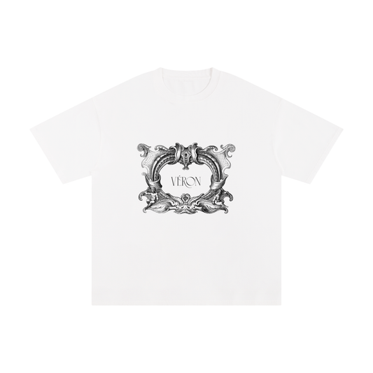 White t-shirt with decorative emblem and 'VERON' text on a white background
