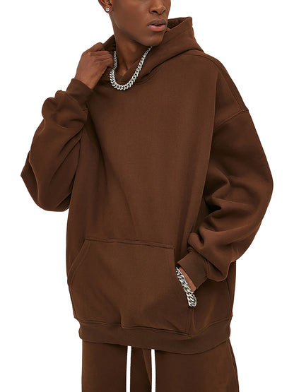Brown hoodie worn by a person on a white background