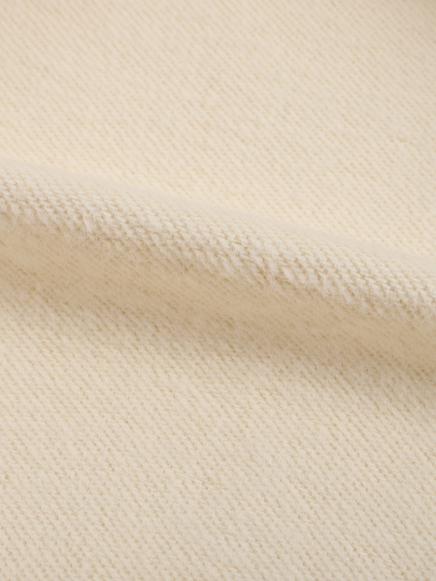 Close-up of beige fabric texture