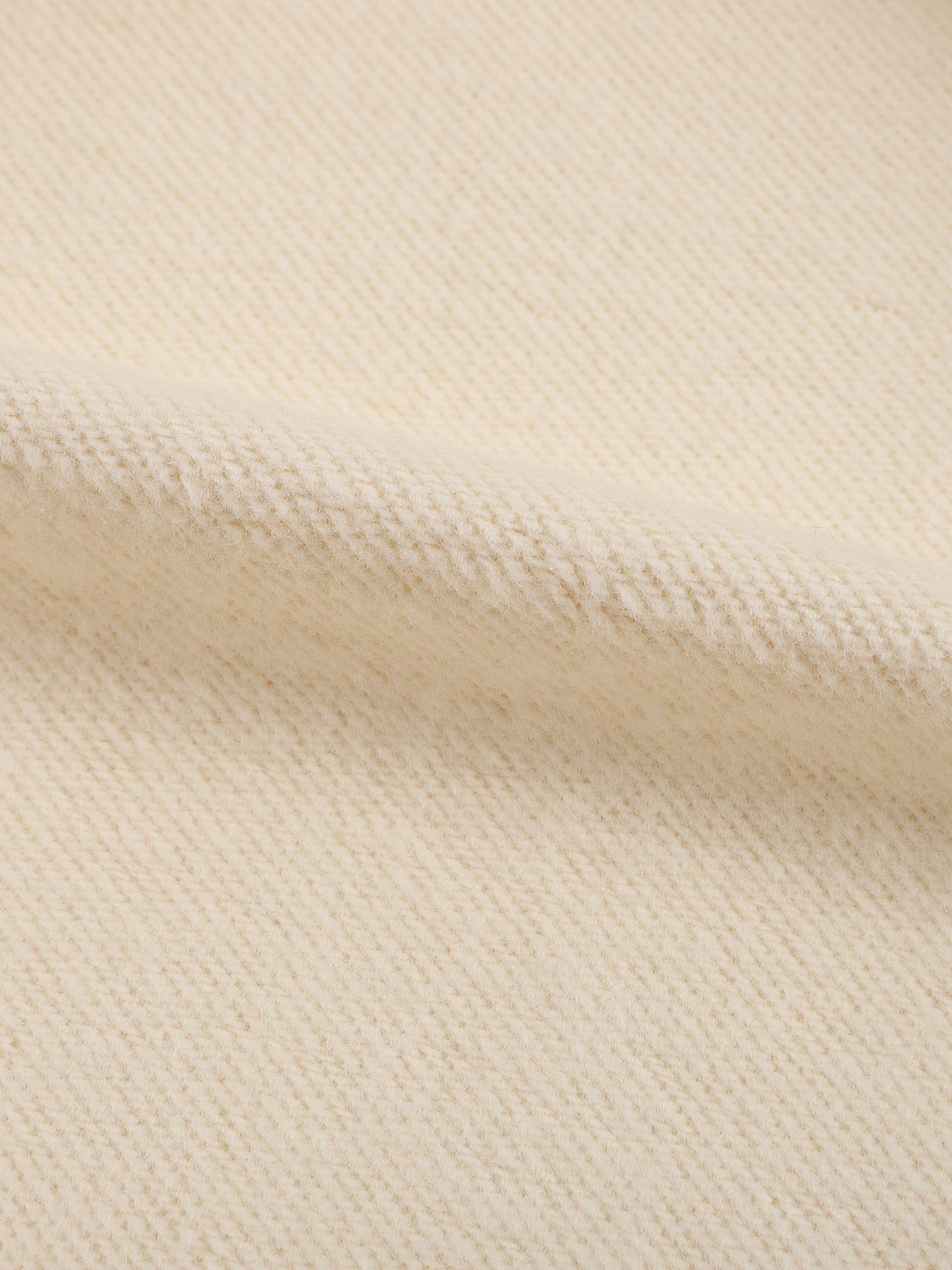 Close-up of beige fabric texture