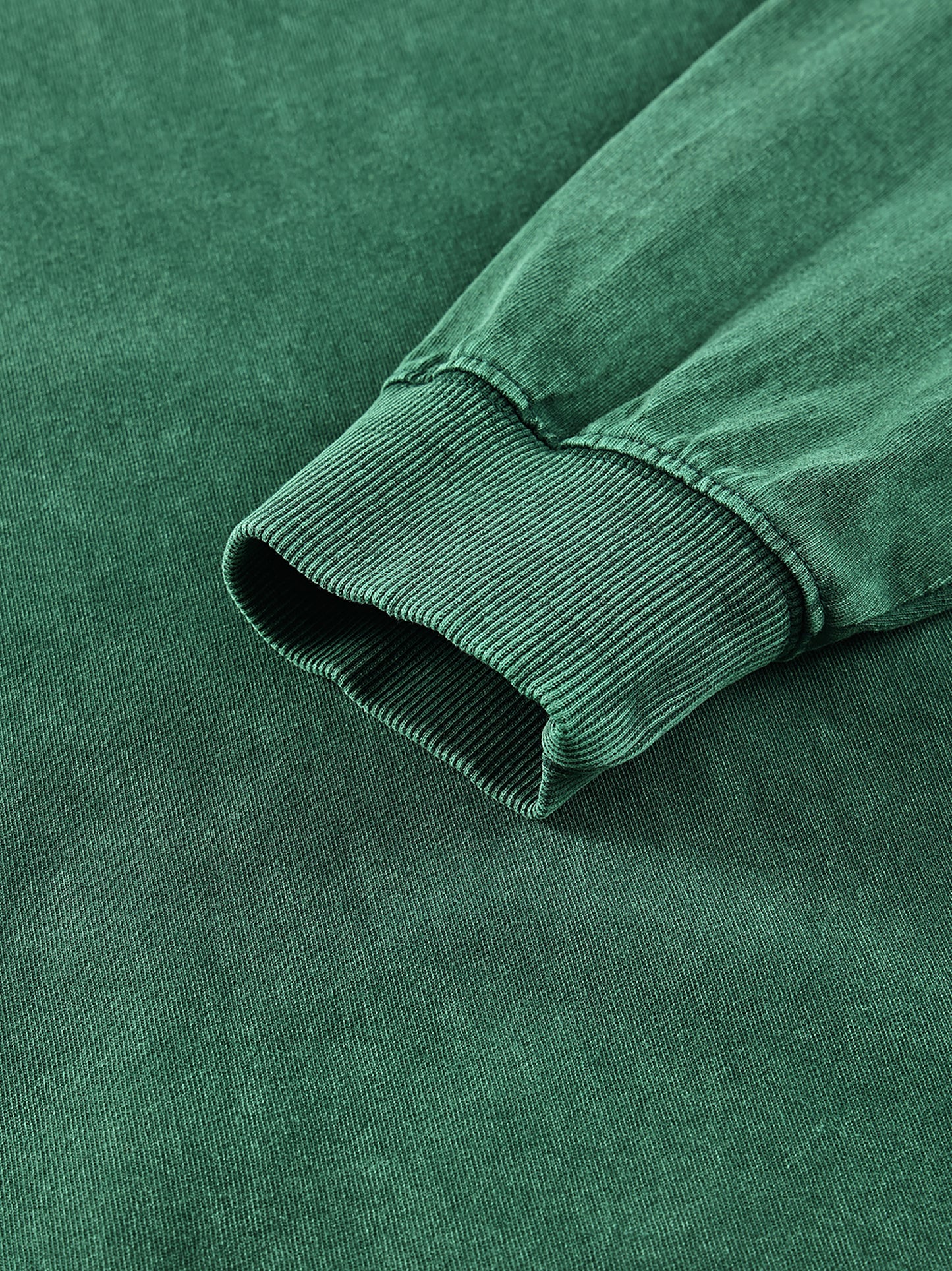 Close-up of a green fabric with a ribbed texture