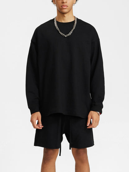 Model wearing VÉRON Magnolia long sleeve streetwear oversized style 4