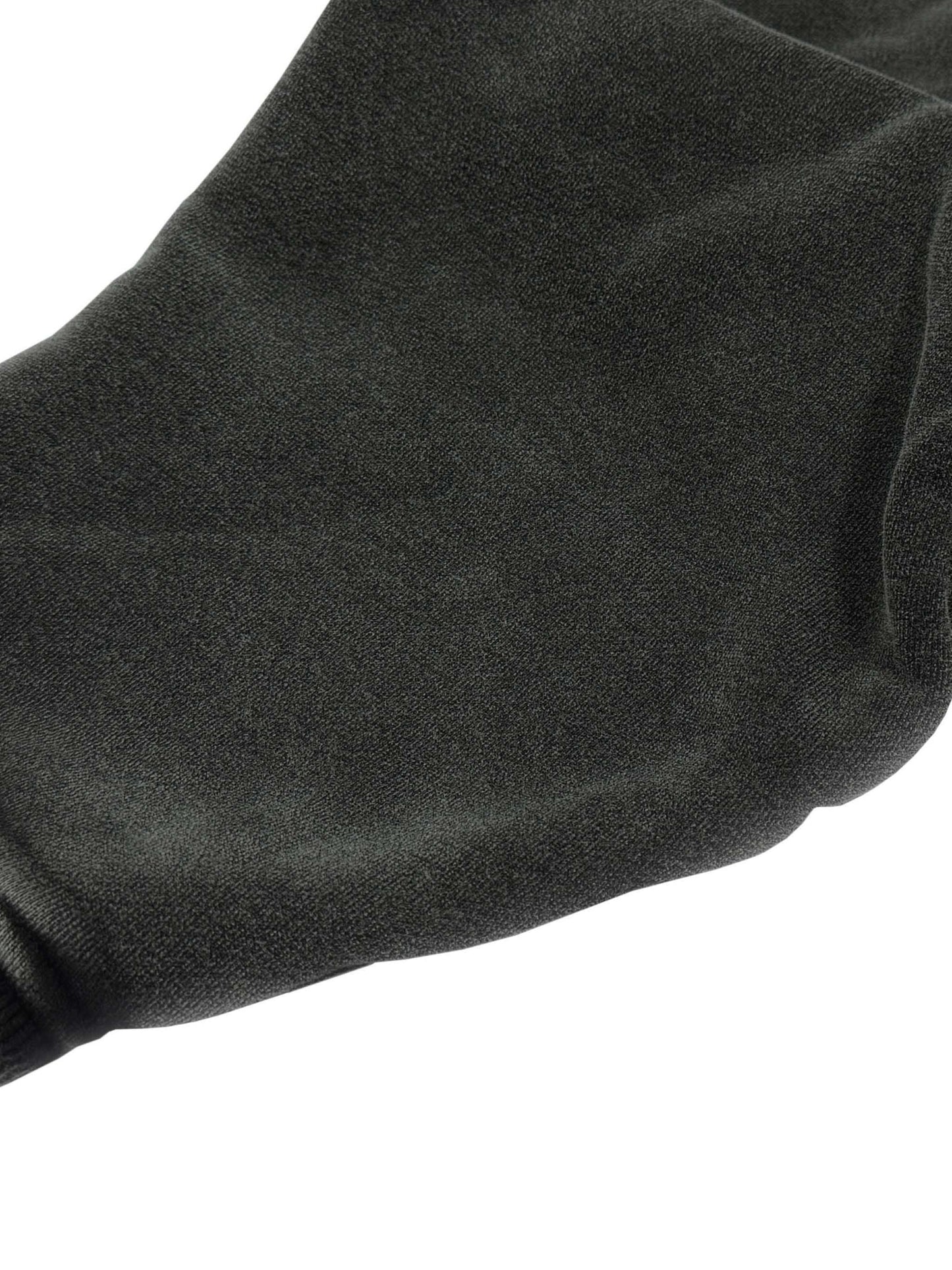 Close-up of a black sock on a white background