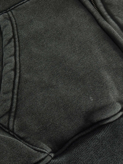 Close-up of dark gray fabric with a textured surface