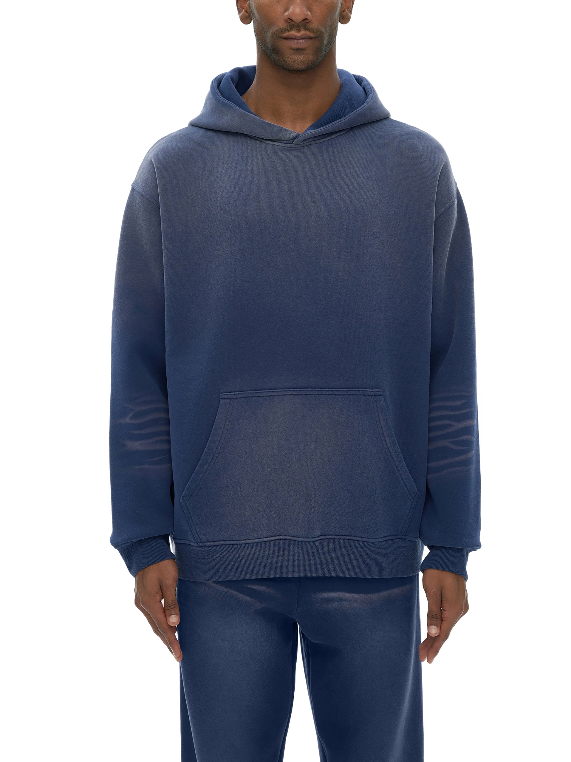 Model styling VÉRON La Fille hoodie in urban streetwear outfit 3