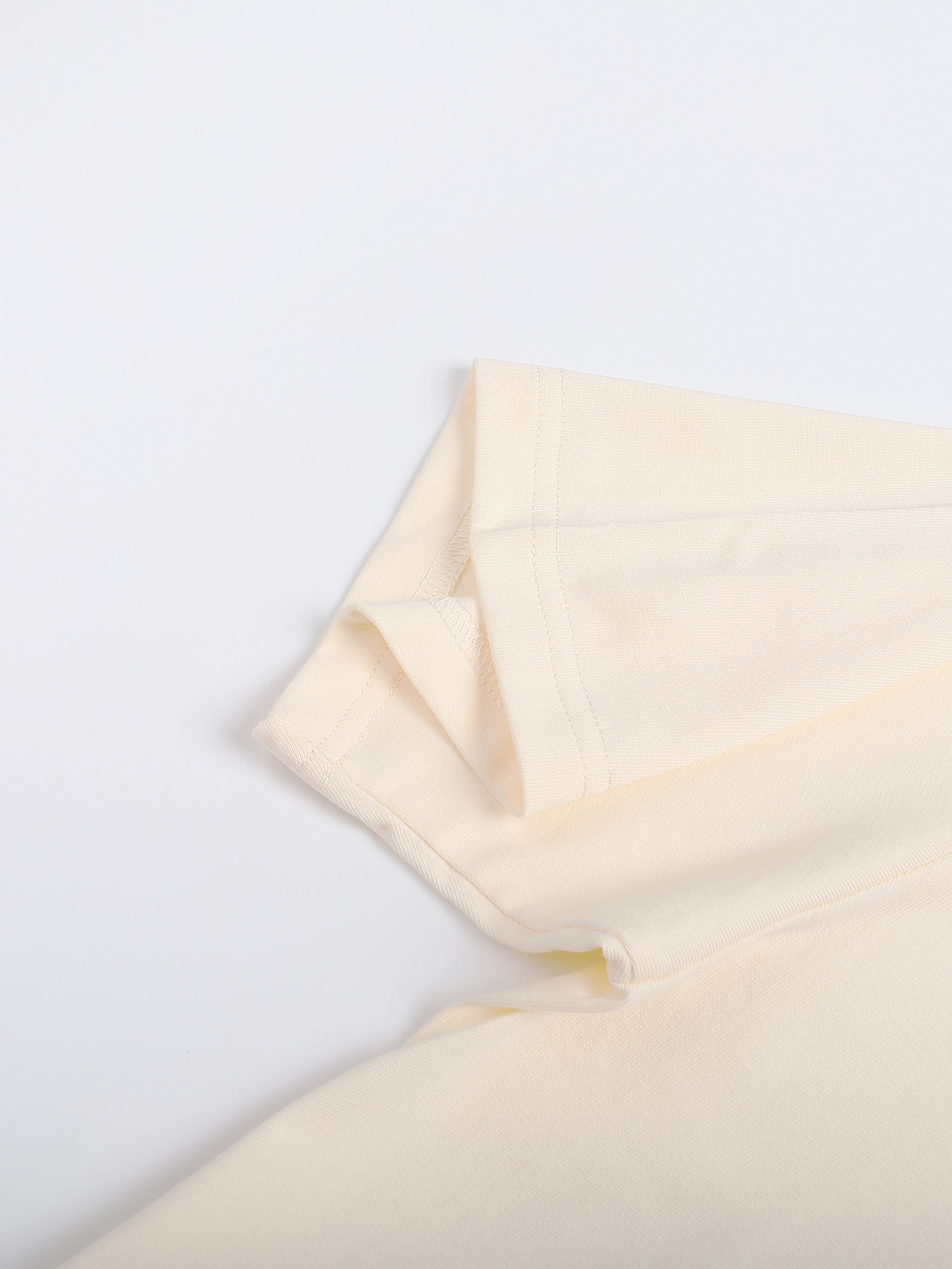 Beige fabric on a light gray background