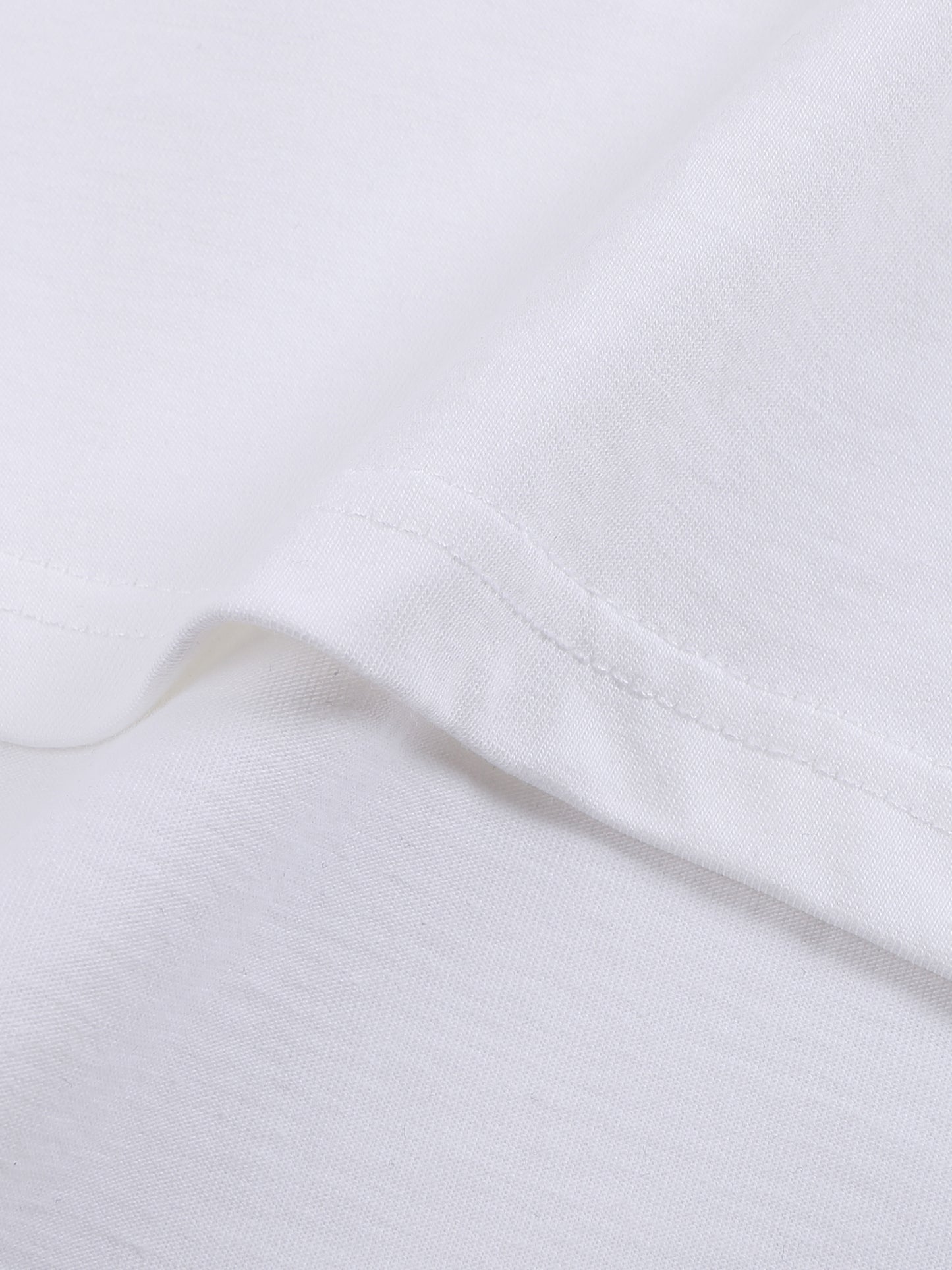 Close-up of white fabric with a subtle texture