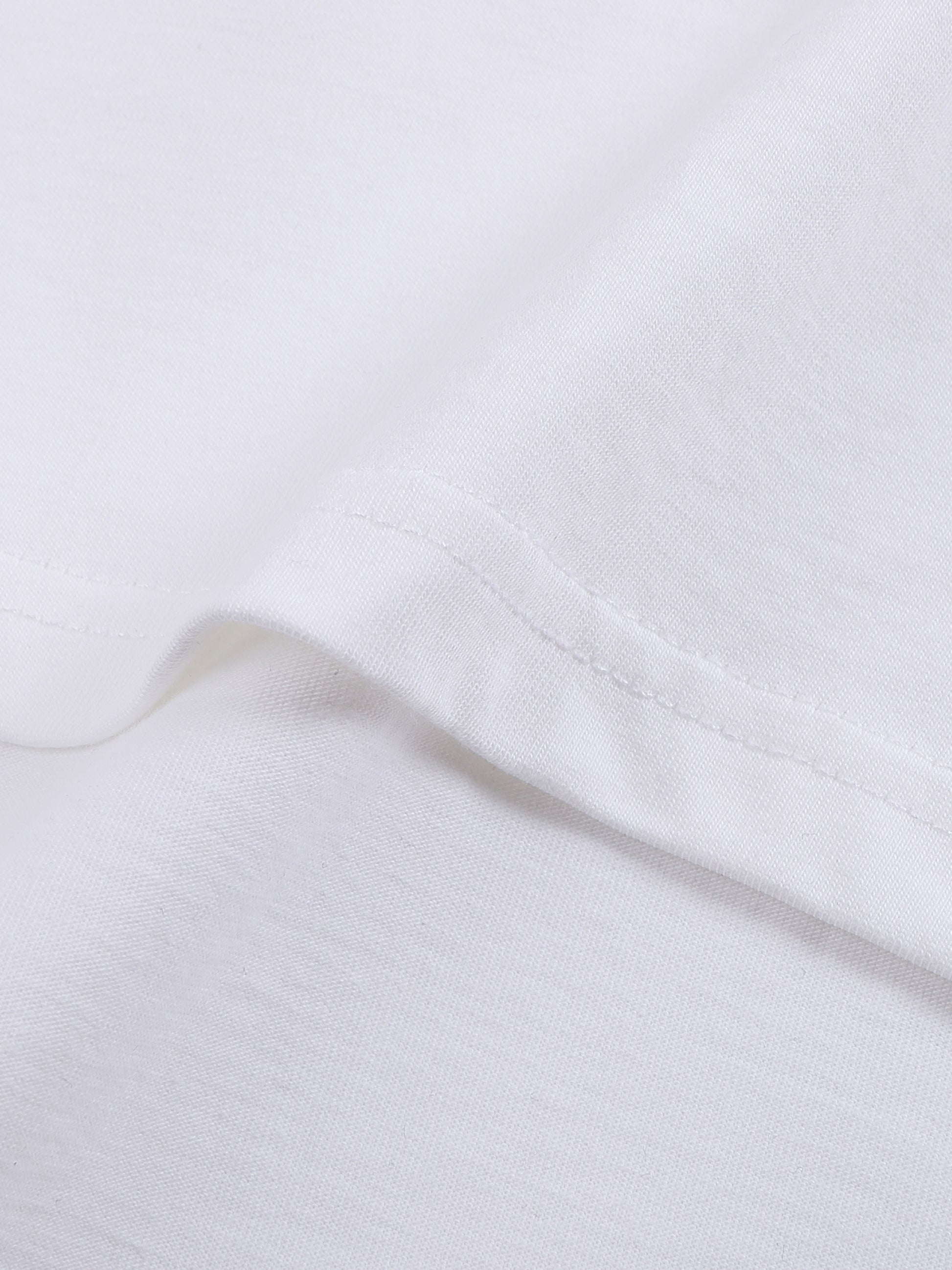 Close-up of white fabric with a subtle texture