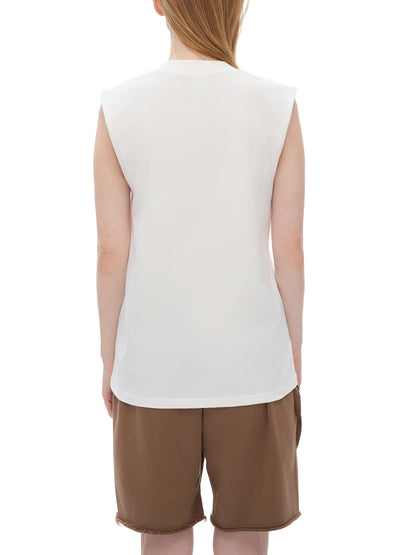 Person wearing a white sleeveless tank top and brown shorts on a white background