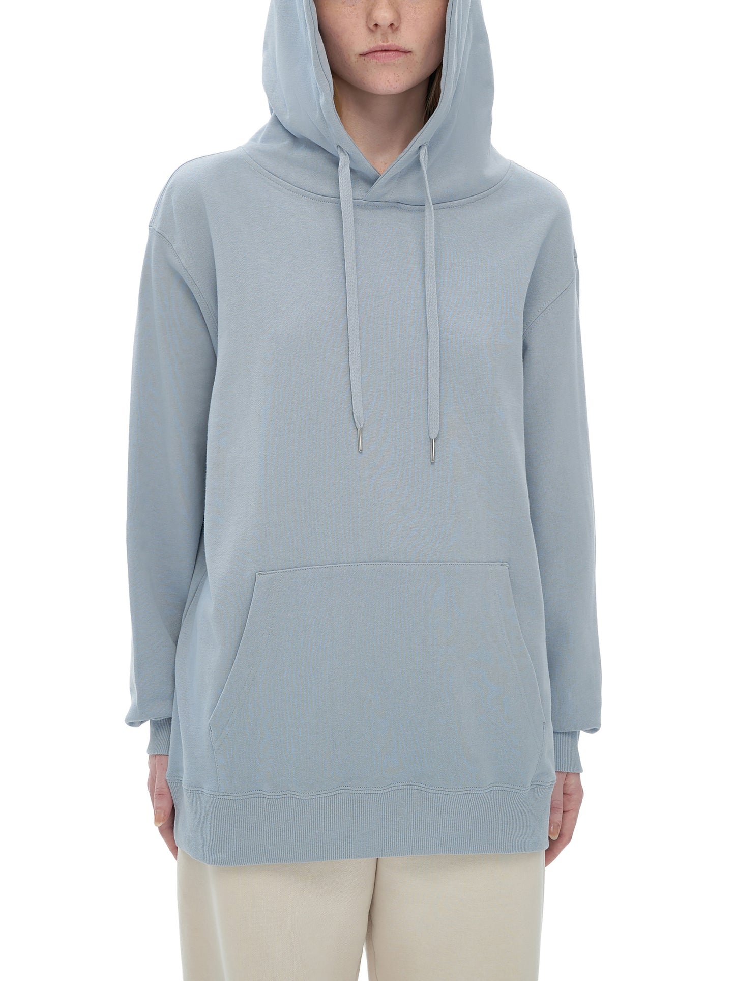 Lifestyle shot of VÉRON Quartz hoodie with minimalist streetwear vibe 4