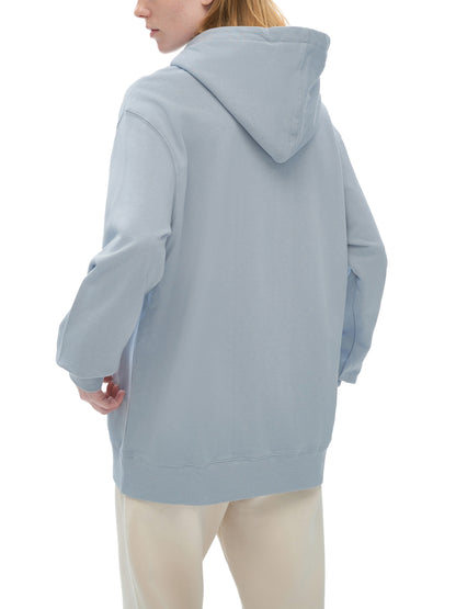 Lifestyle shot of VÉRON Quartz hoodie with minimalist streetwear vibe 5