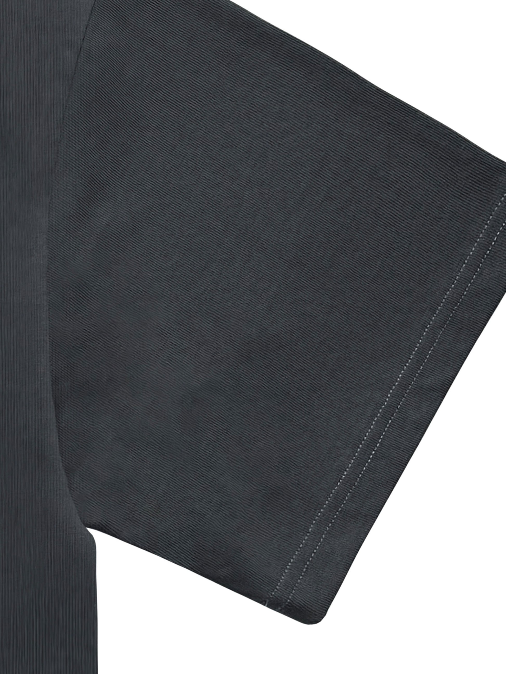 Detail shot of collar and sleeves – VÉRON Rue Royale shirt craftsmanship.


