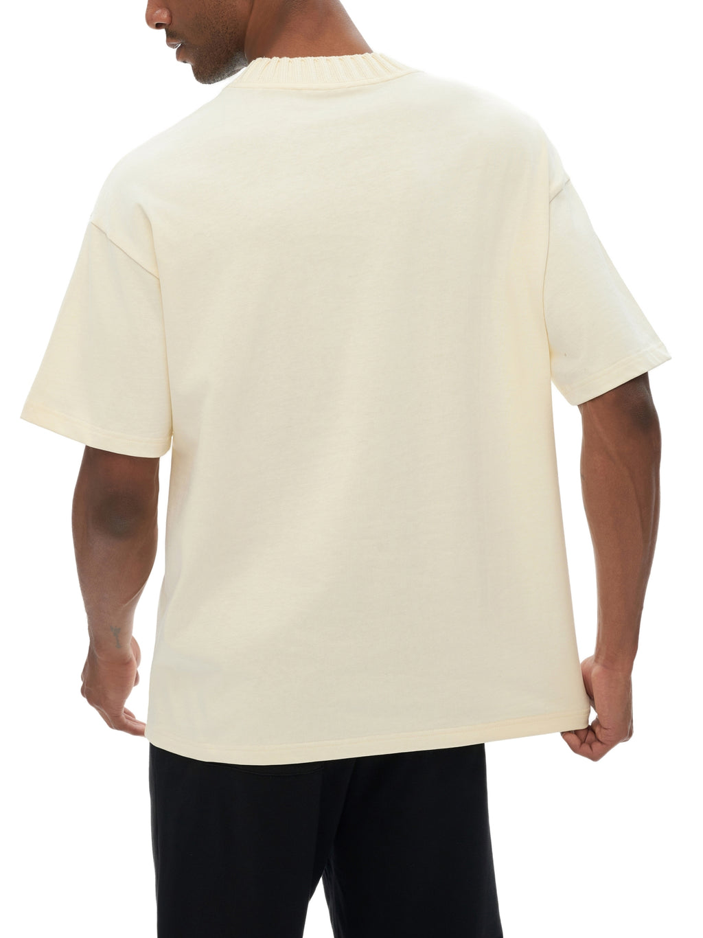 Model wearing VÉRON Paris-inspired knitted shirt streetwear style 3