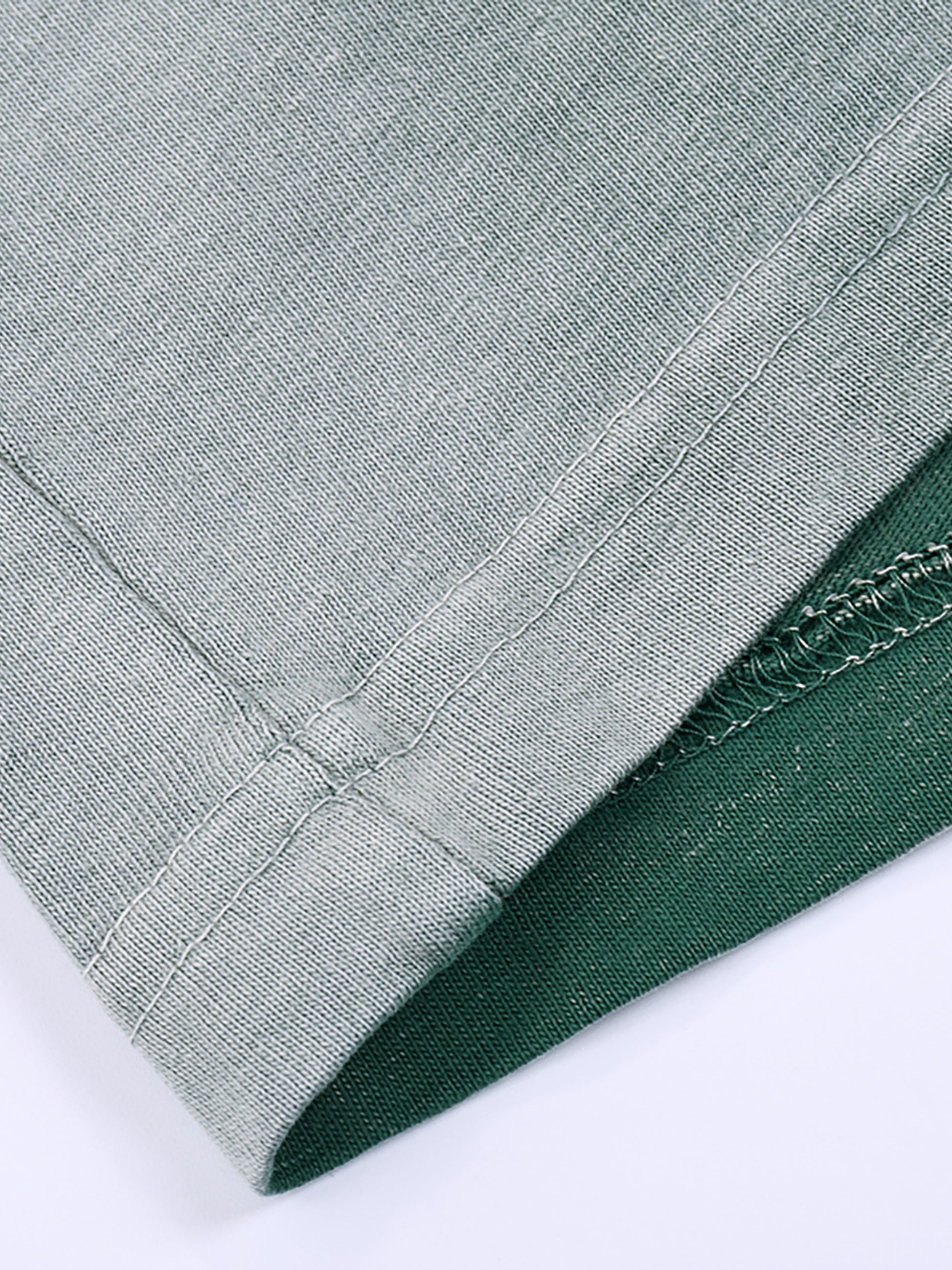 Close-up of cotton fabric on VÉRON Avenue Foch Paris streetwear tee 4