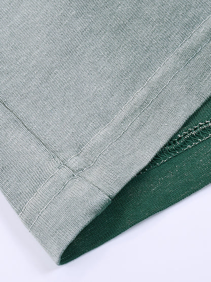 Close-up of cotton fabric on VÉRON Avenue Foch Paris streetwear tee 4