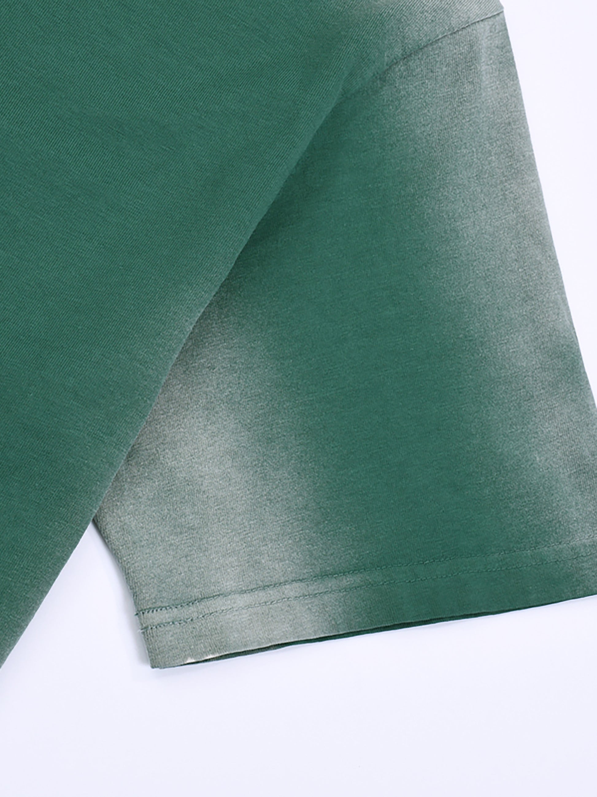Close-up of cotton fabric on VÉRON Avenue Foch Paris streetwear tee