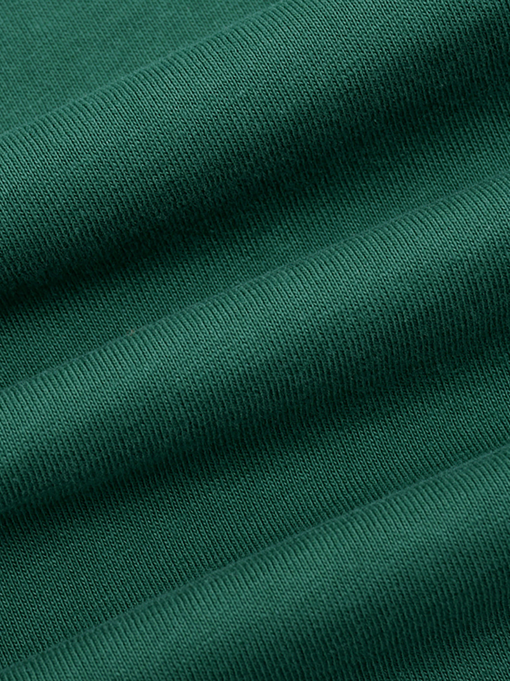 Close-up of cotton fabric on VÉRON Avenue Foch Paris streetwear tee 2