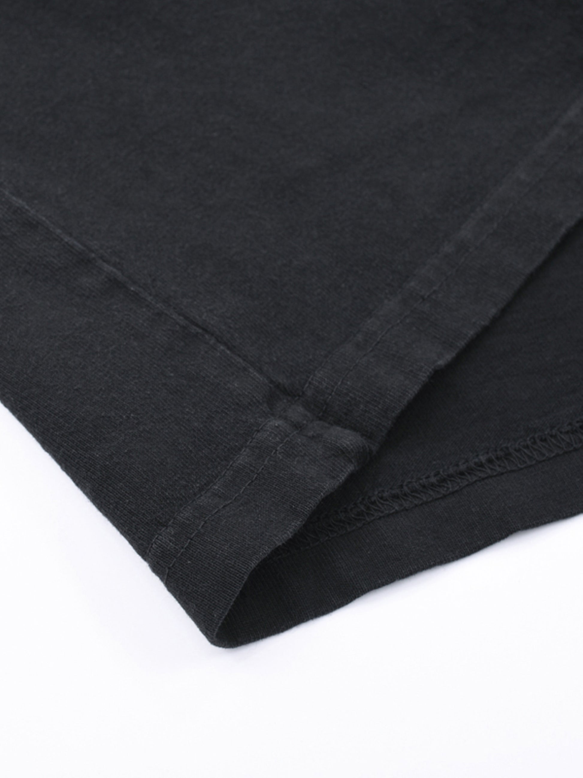 Close-up of fabric quality on VÉRON Cléophée luxury graphic tee 3