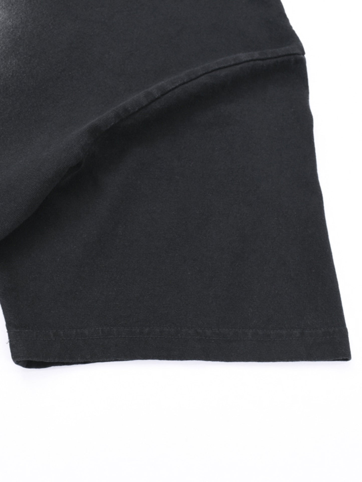 Close-up of fabric quality on VÉRON Cléophée luxury graphic tee 4