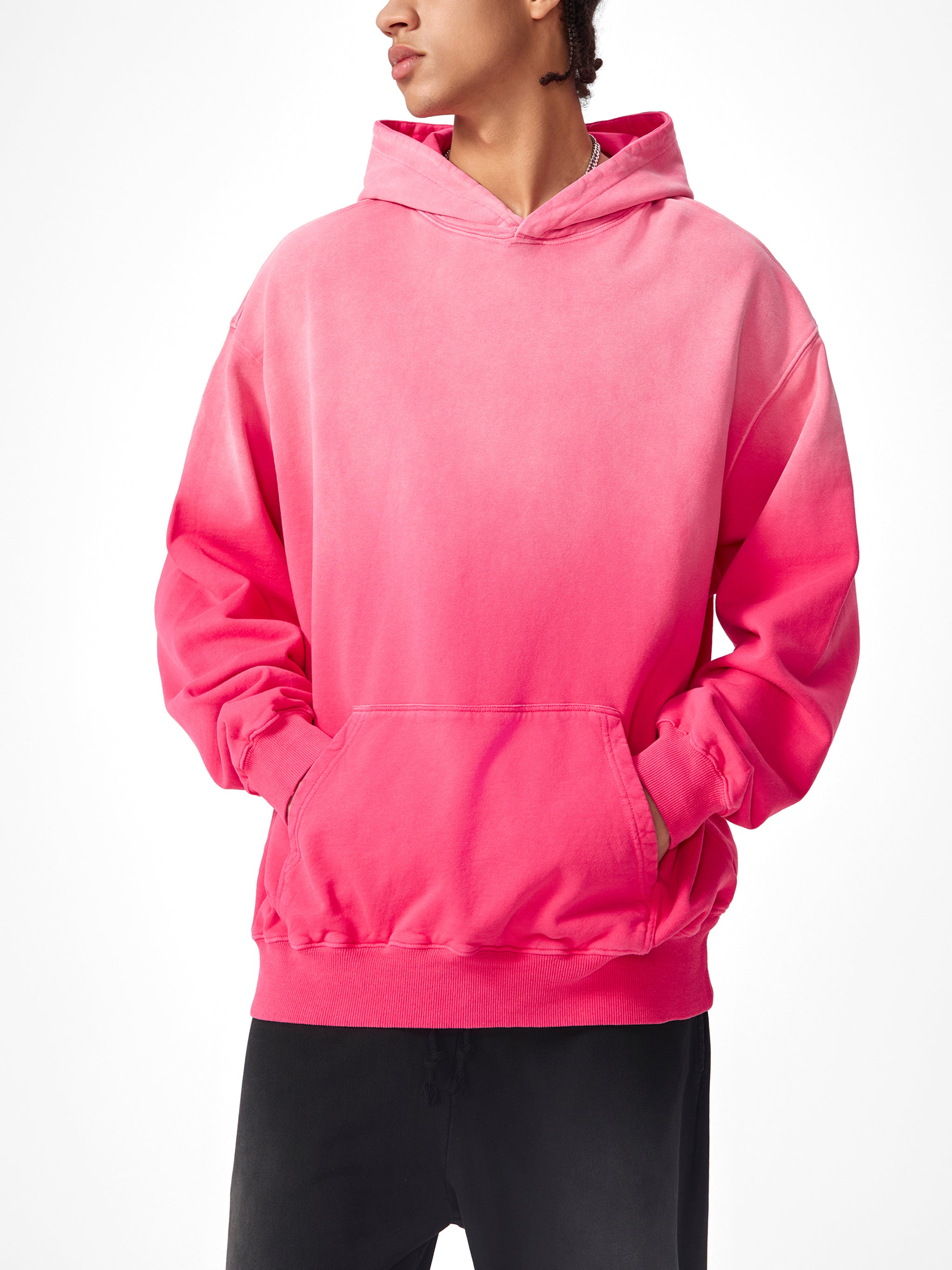 Model wearing VERON bright pink hoodie 2