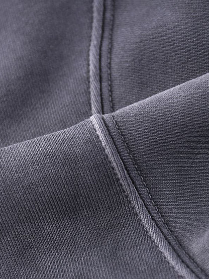 Close-up of a gray fabric with stitching detail