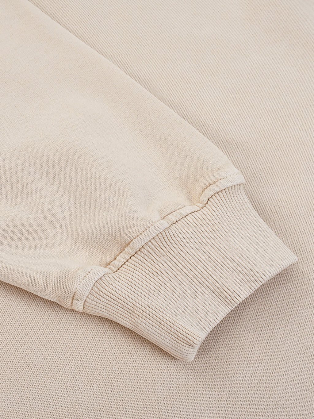 Close-up of vintage washed platinum fabric on VÉRON sweatshirt 3