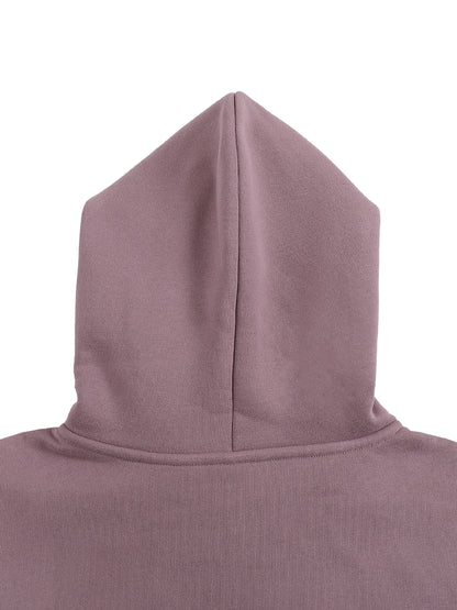 Close-up of a hooded garment in a solid color on a white background