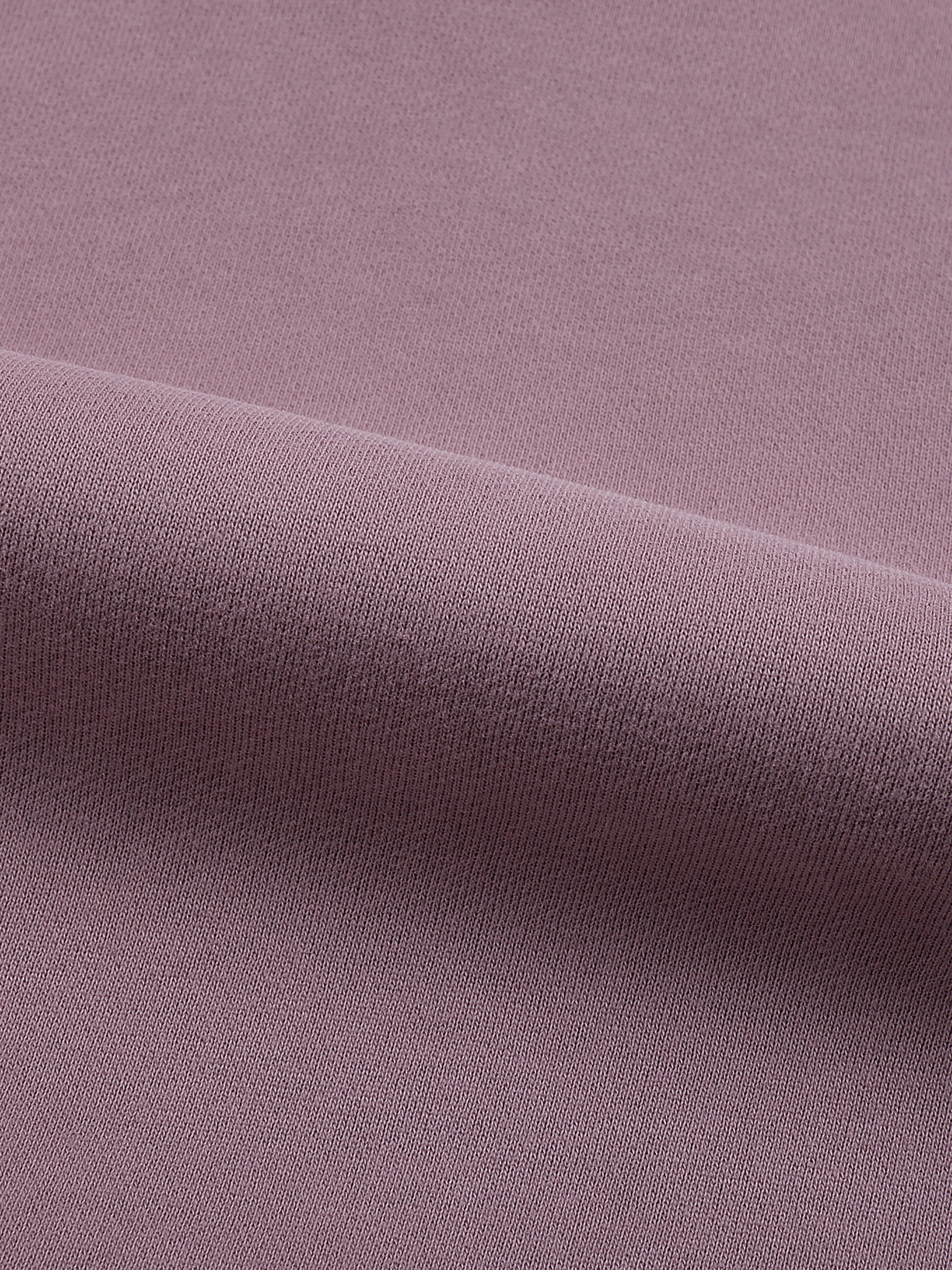 Close-up of purple fabric with a slight texture