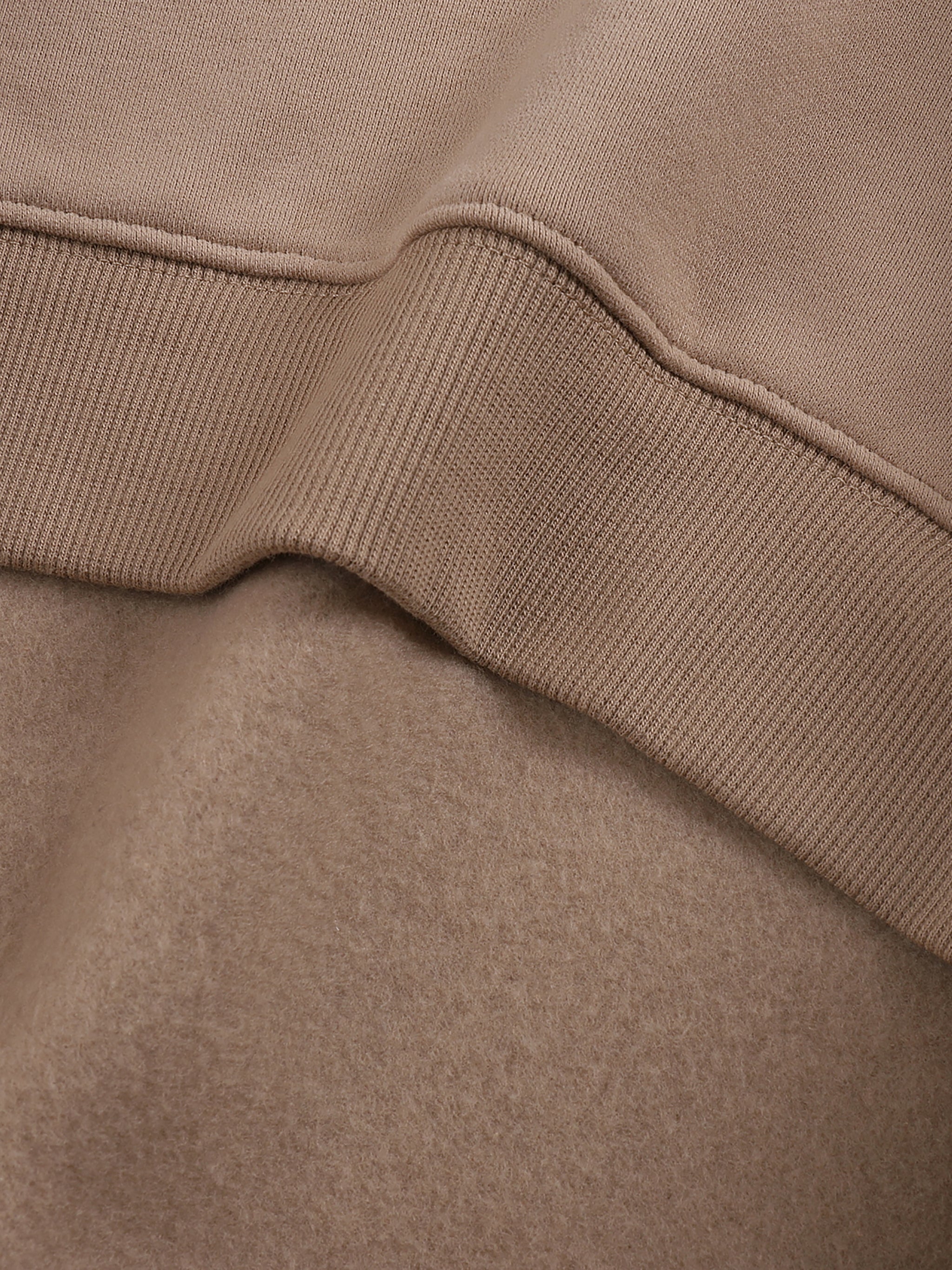 Close-up of a brown fabric with a ribbed texture