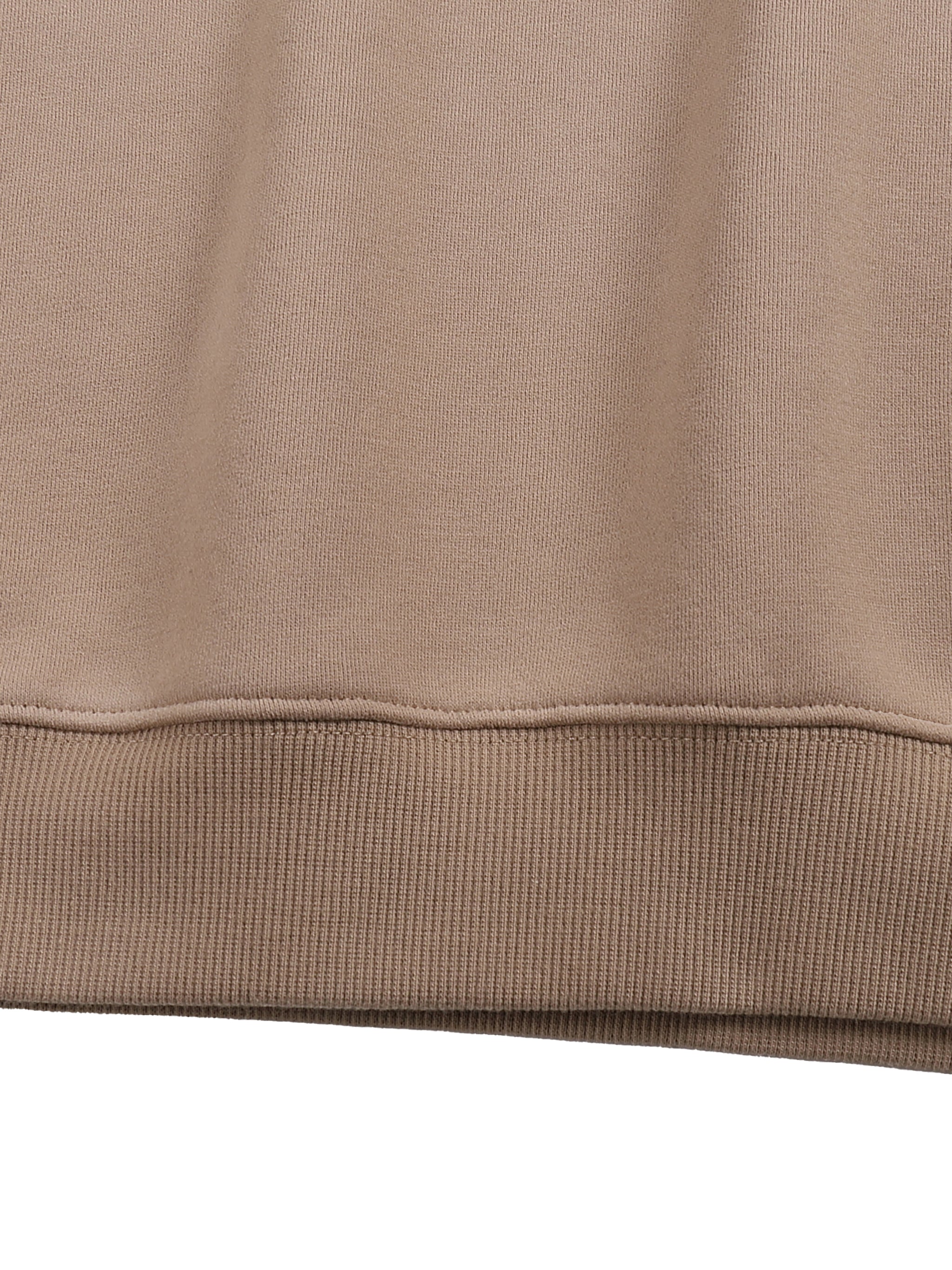 Close-up of a brown fabric texture on a white background