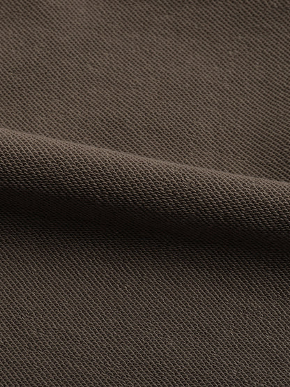 VERON Close-up of brown textured fabric