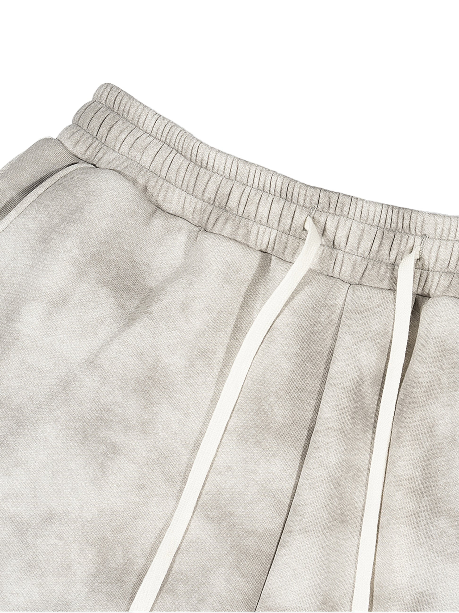 VERON Close-up of light gray sweatpants with drawstring on a white background