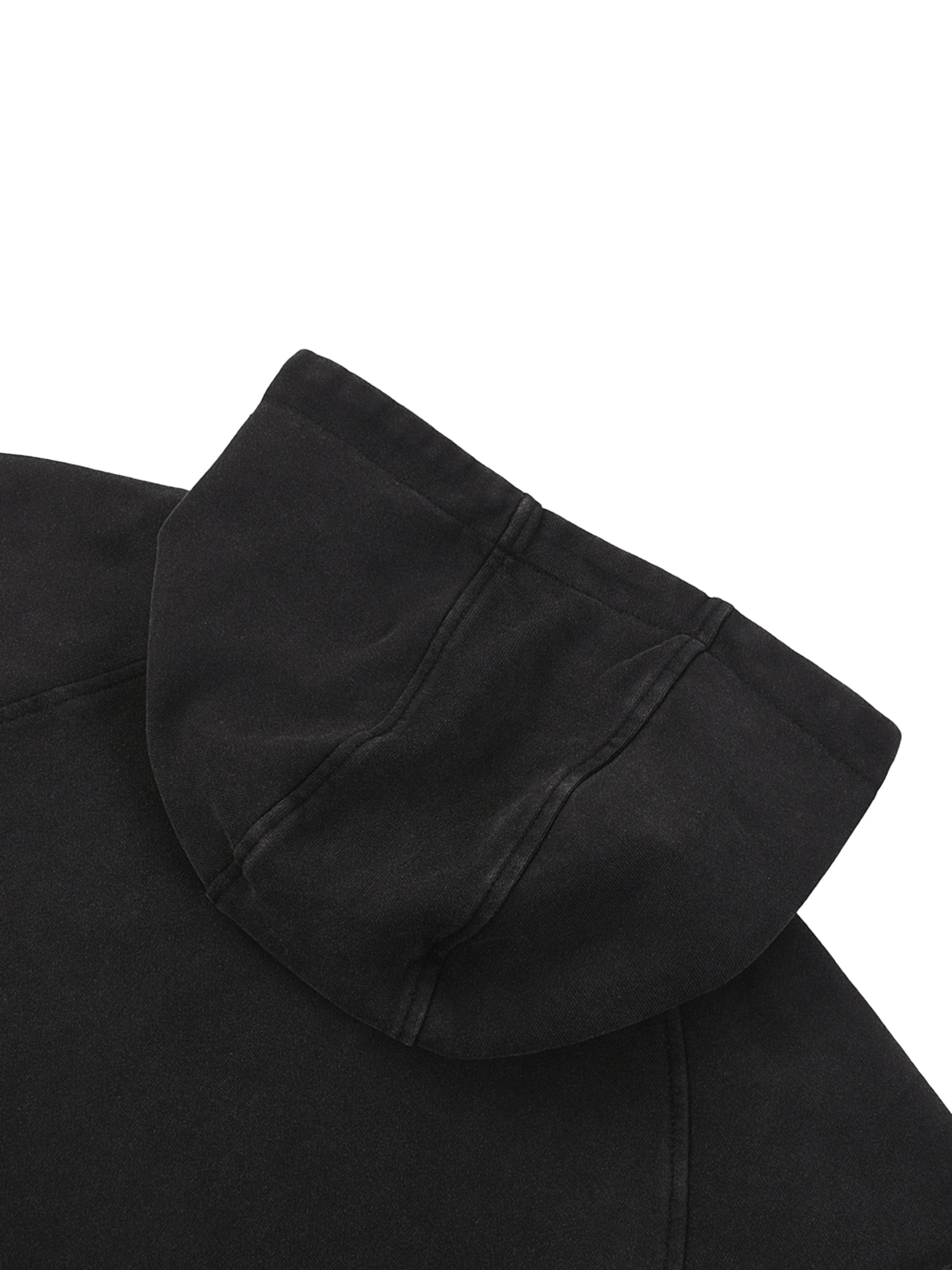Close-up of emerald crown design on VÉRON sleeveless hoodie