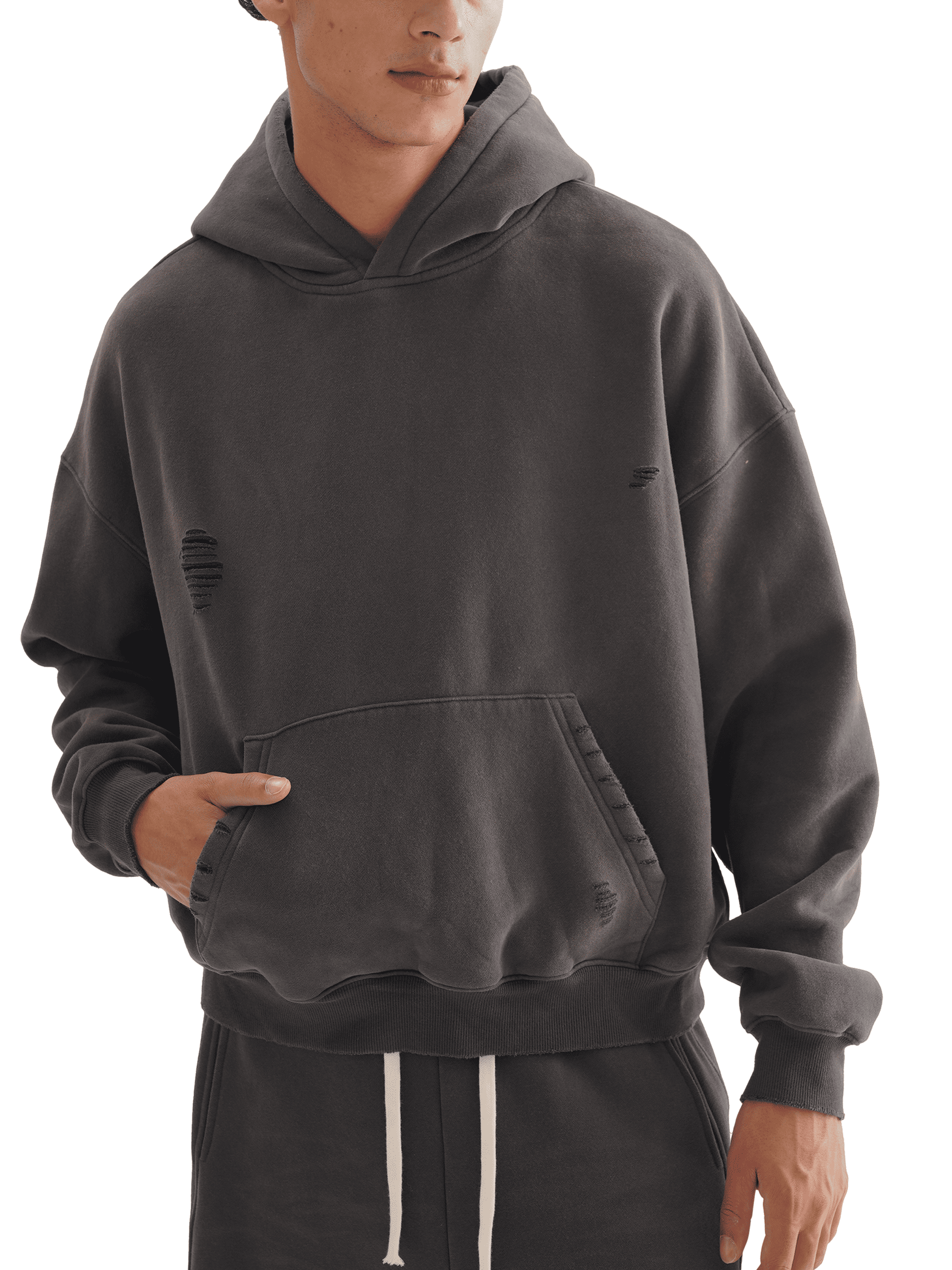 Person wearing a gray hoodie on a white background