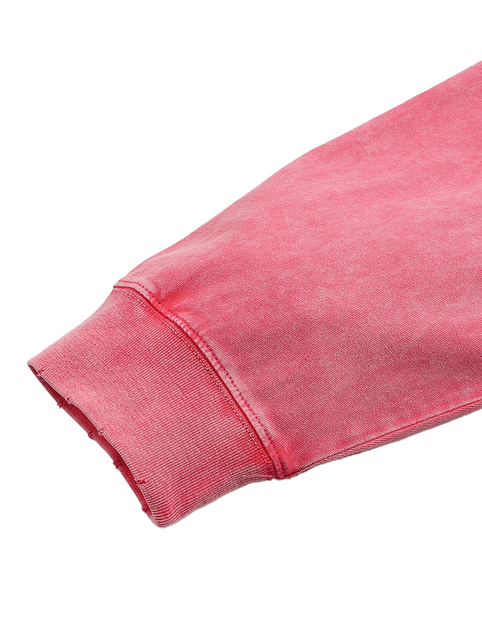 Close-up of a pink fabric sleeve on a white background