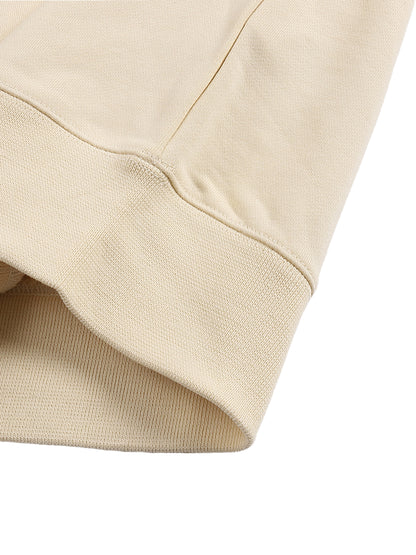 Close-up of beige fabric with a white background