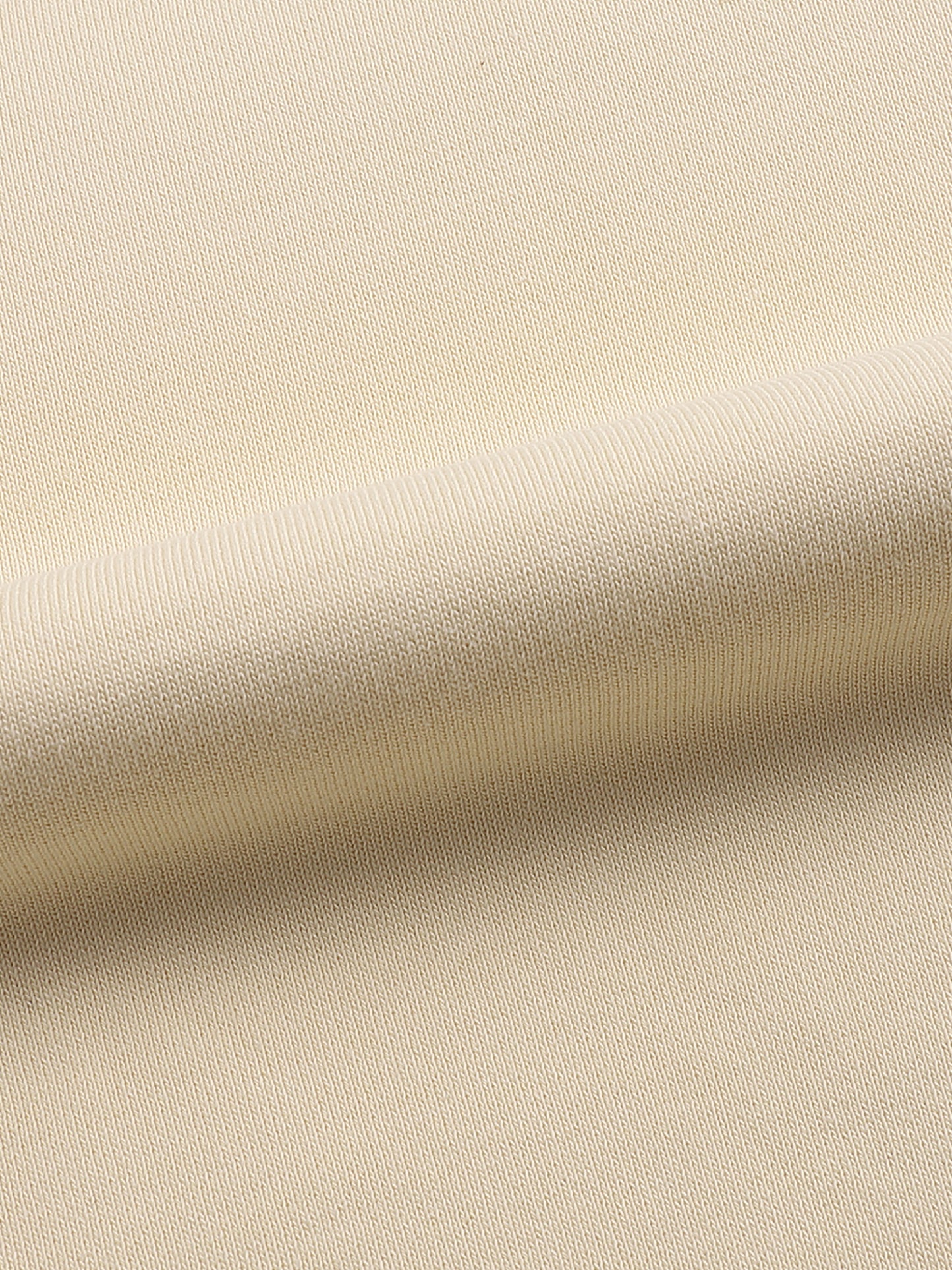 Close-up of beige fabric texture