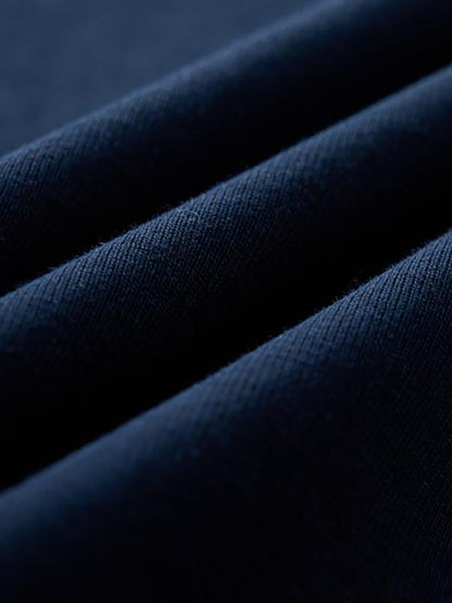 Minimalist premium streetwear tee by VÉRON in motion 3.

