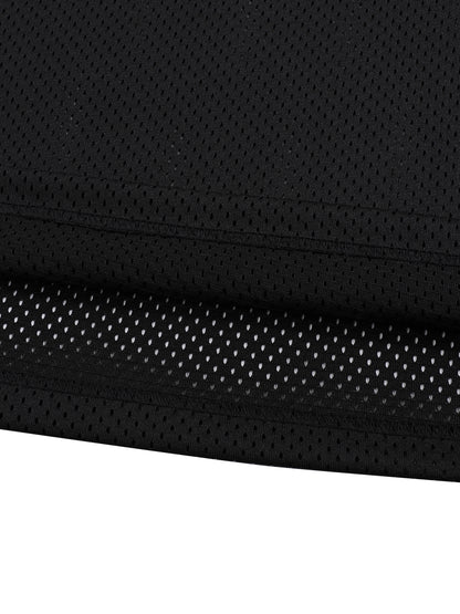 Close-up of black fabric with a textured pattern on a white background