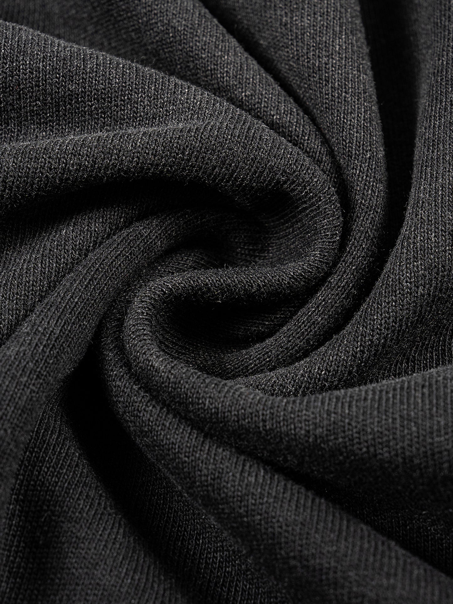Close-up of dark gray fabric with visible texture