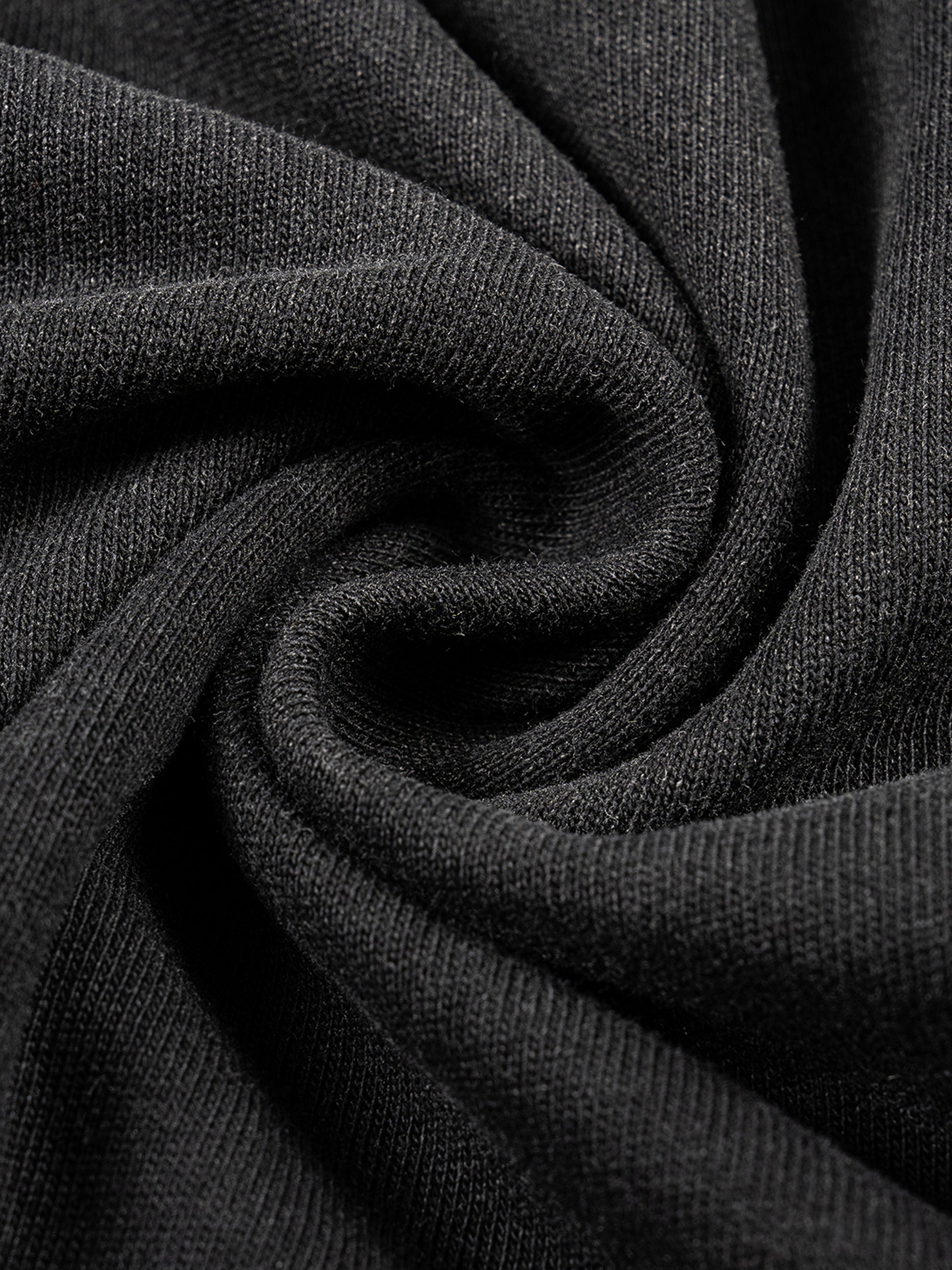 Close-up of dark gray fabric with visible texture