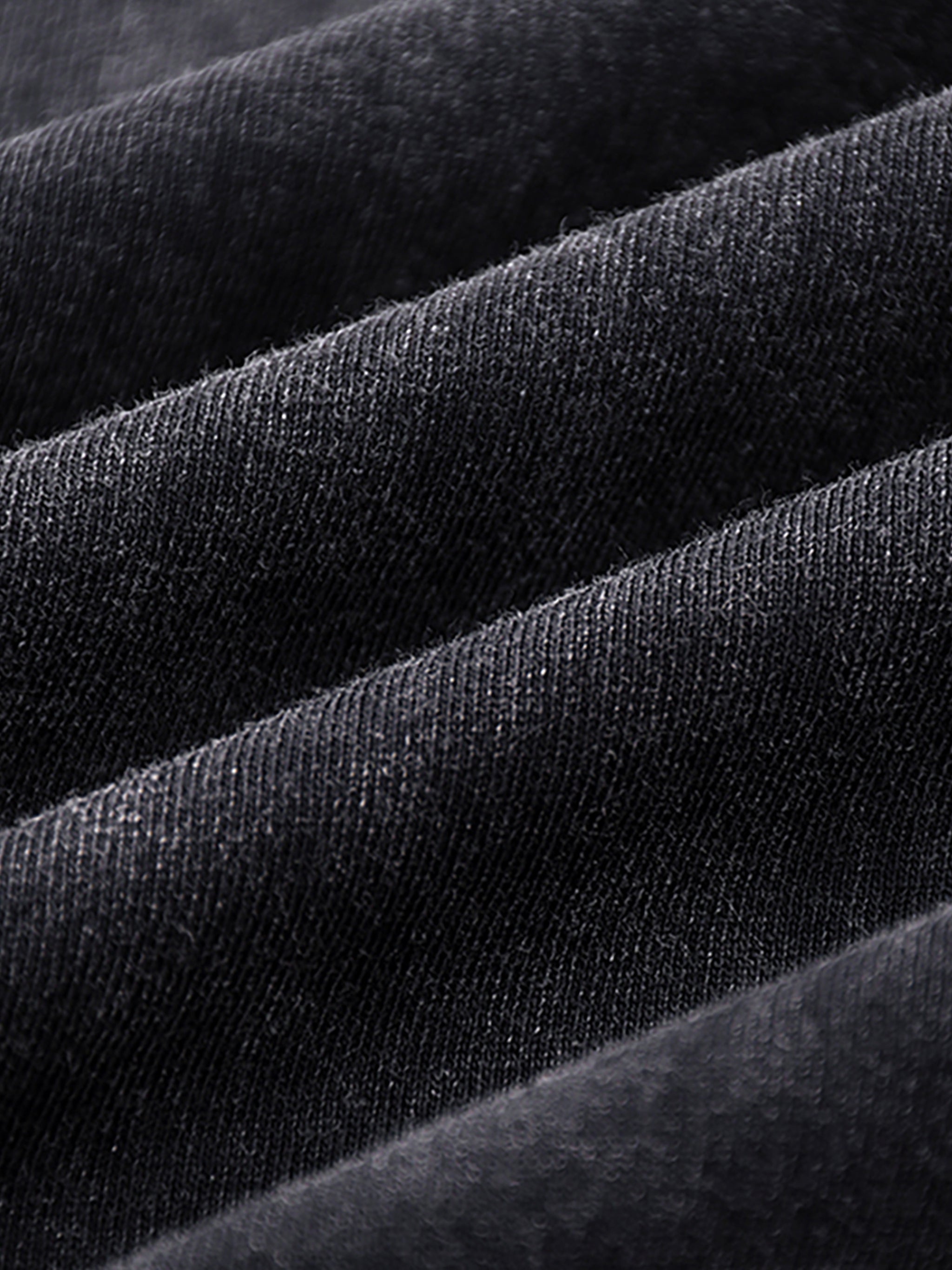 Close-up fabric detail of VÉRON Rue du Savoir luxury tank top 2