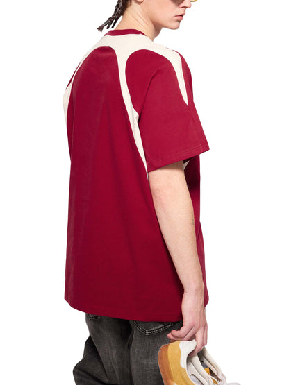 Model wearing VÉRON Le Monarque premium tee 4
