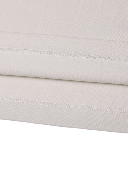 Close-up of a folded light gray fabric with visible stitching on a white background