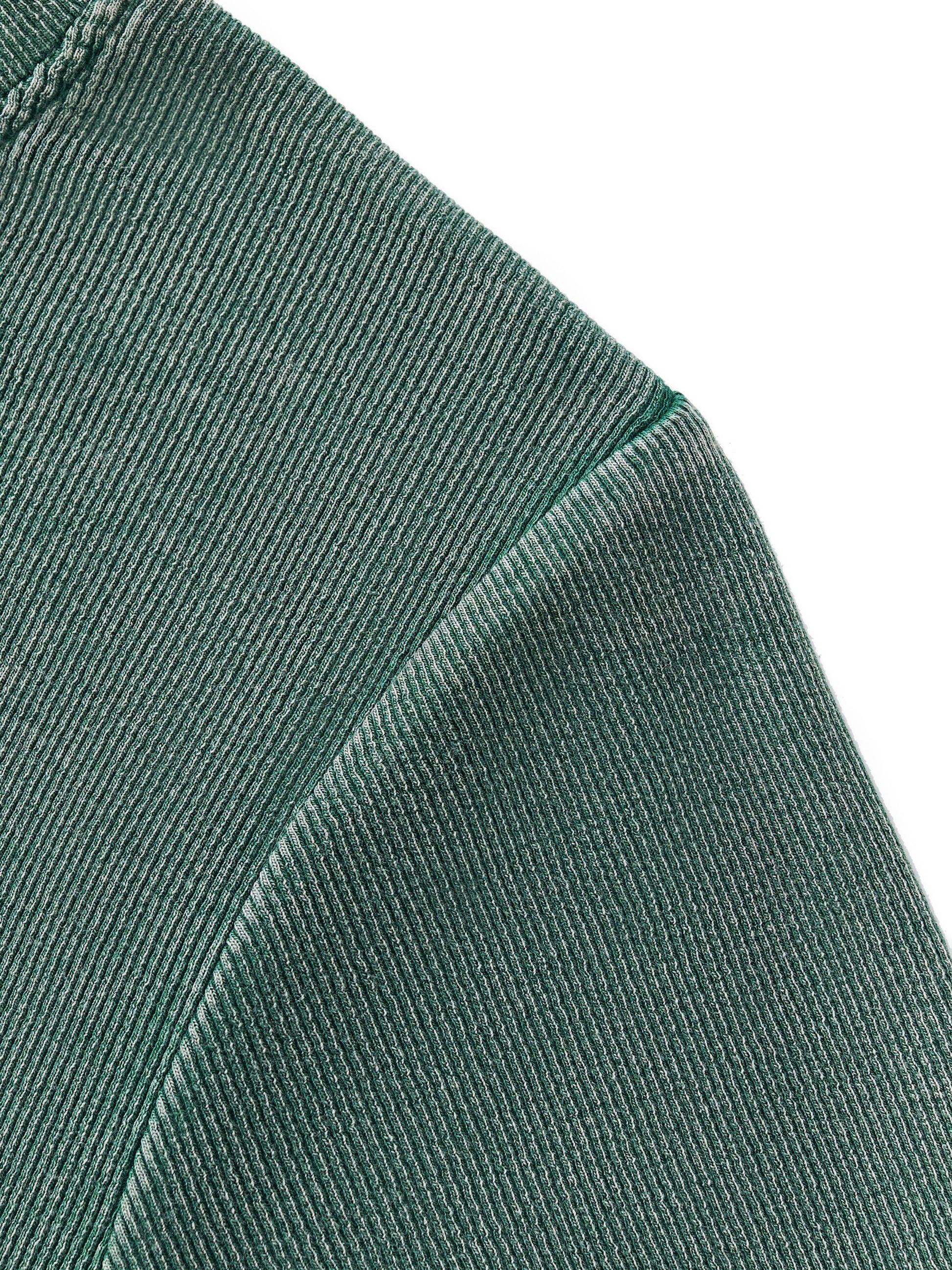 Close-up of thick vintage-wash fabric texture of VÉRON women's tee 3.


