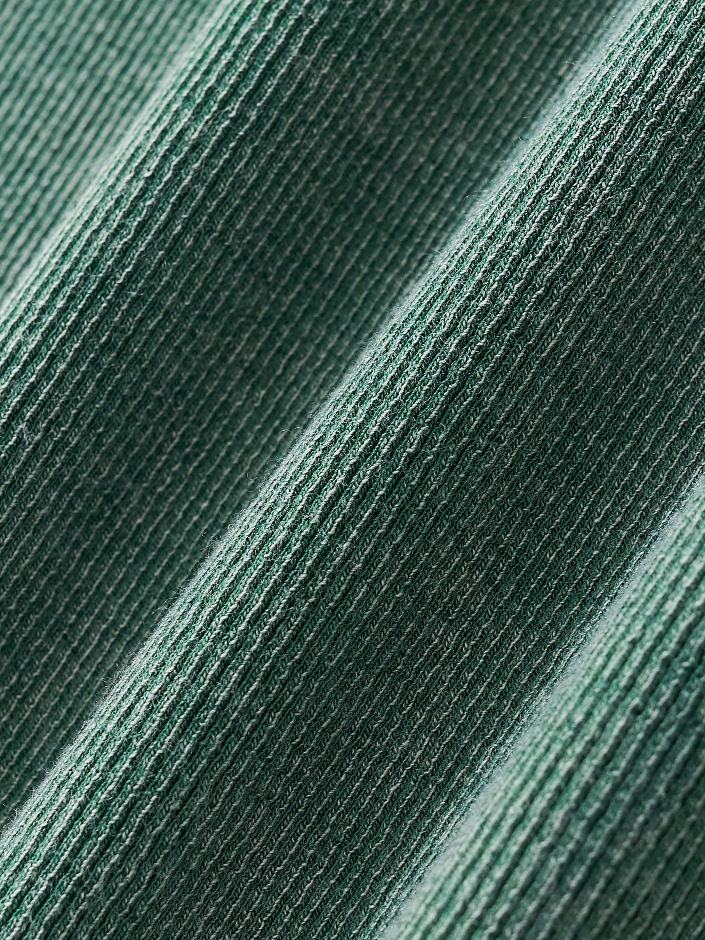 Close-up of thick vintage-wash fabric texture of VÉRON women's tee 5. 

