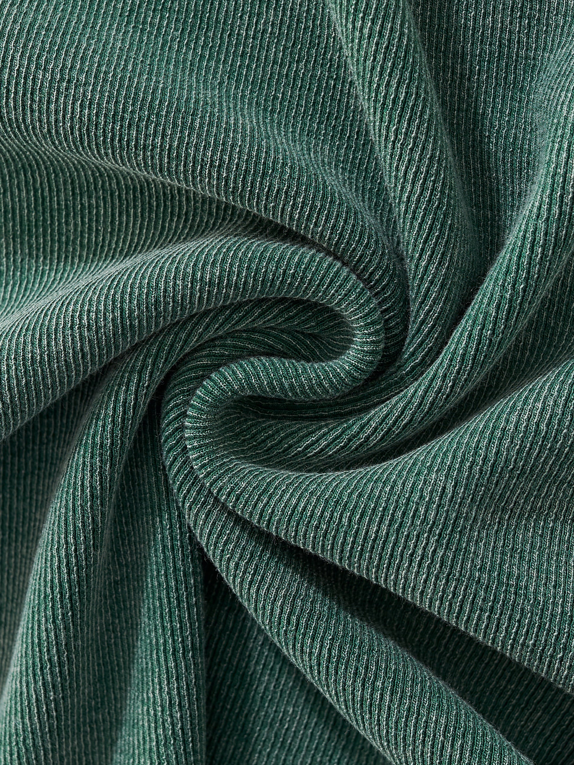 Close-up of thick vintage-wash fabric texture of VÉRON women's tee 4. 

