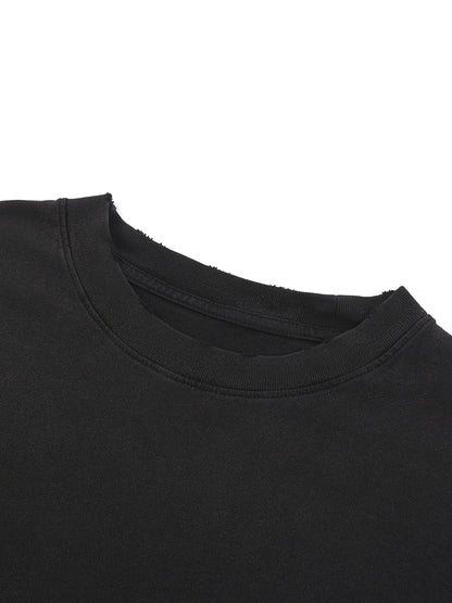 Close-up of a black sweatshirt collar on a white background